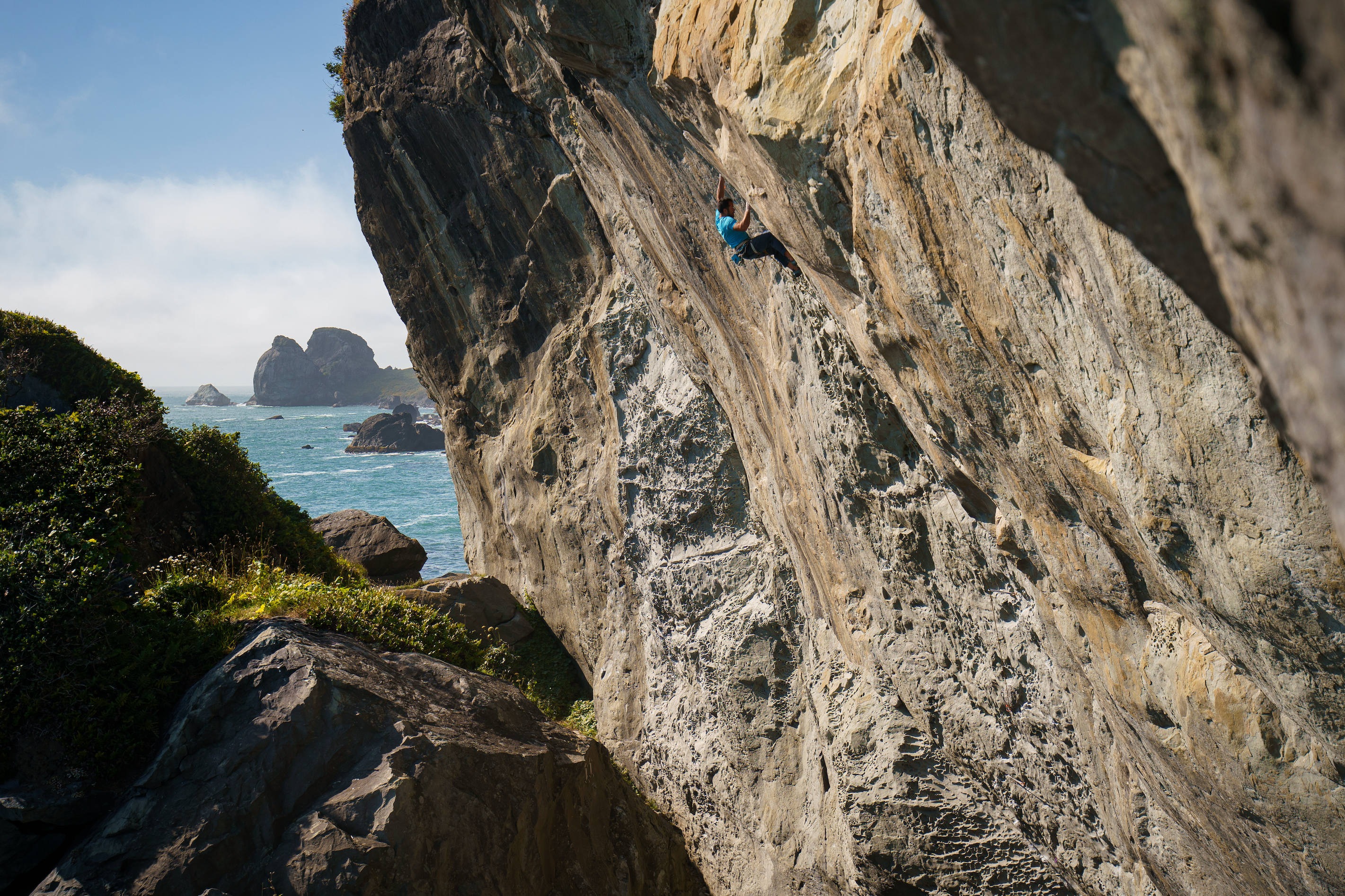 In coastal climbing areas like Promontory in northern California, steel bolts can weaken from corrosion in a matter of months. Pictured here, a climber leads "Great White" (5.12b), one of the area's classic routes.